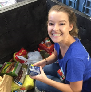 Nestle volunteer sorting groceries-2018